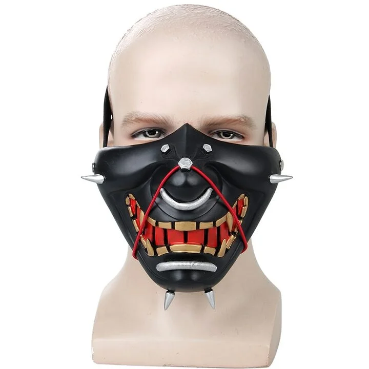 Demi masque japonais samouraï noir avec dents rouges et blanches, pointes argentées et cordon rouge, vue de face