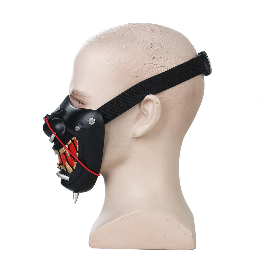 Demi masque japonais samouraï noir avec détails rouges et attaches métalliques, vue de profil gauche